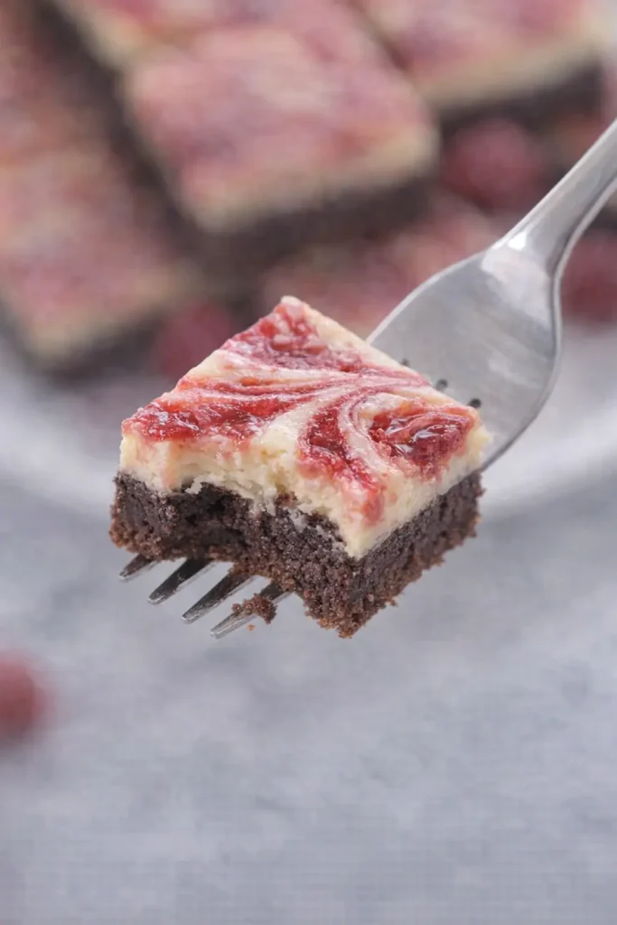 White Chocolate Raspberry Cheesecake Brownies ( with a fork )